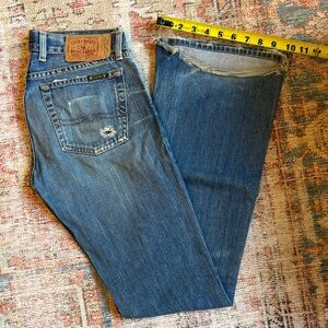 Lucky Brand Lil' Maggie's. Low rise boot cut distressed long length jeans